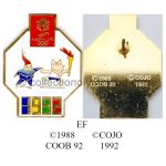 178 01 pin's pont entre Albertville 1992 logo et Barcelone 1992 avec mascottes olympiques Magique et Cobi émail à froid signé © 1988 COOB 92 © COJO 1992